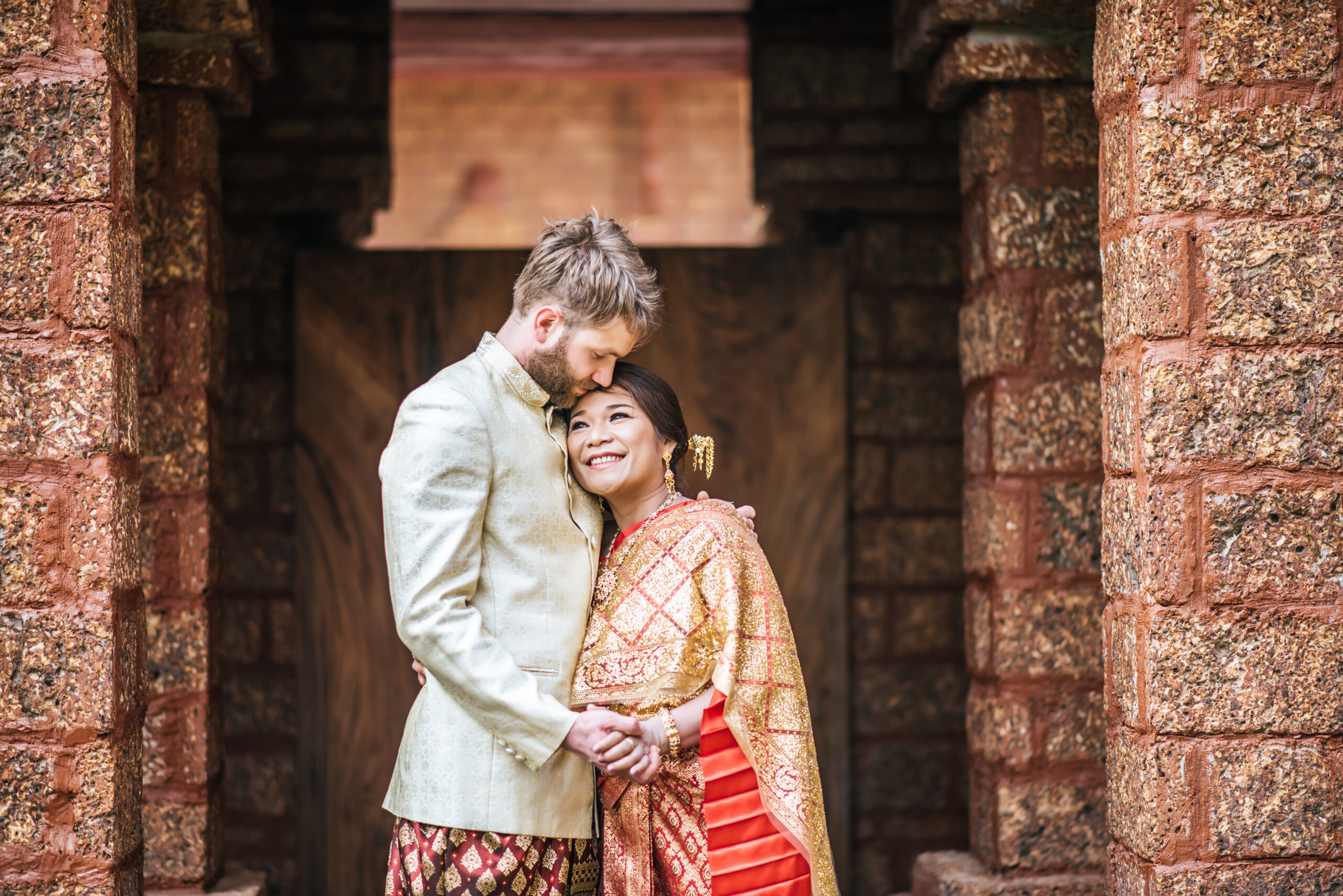 Asian bride and Caucasian groom have romantic time with Thailand dress