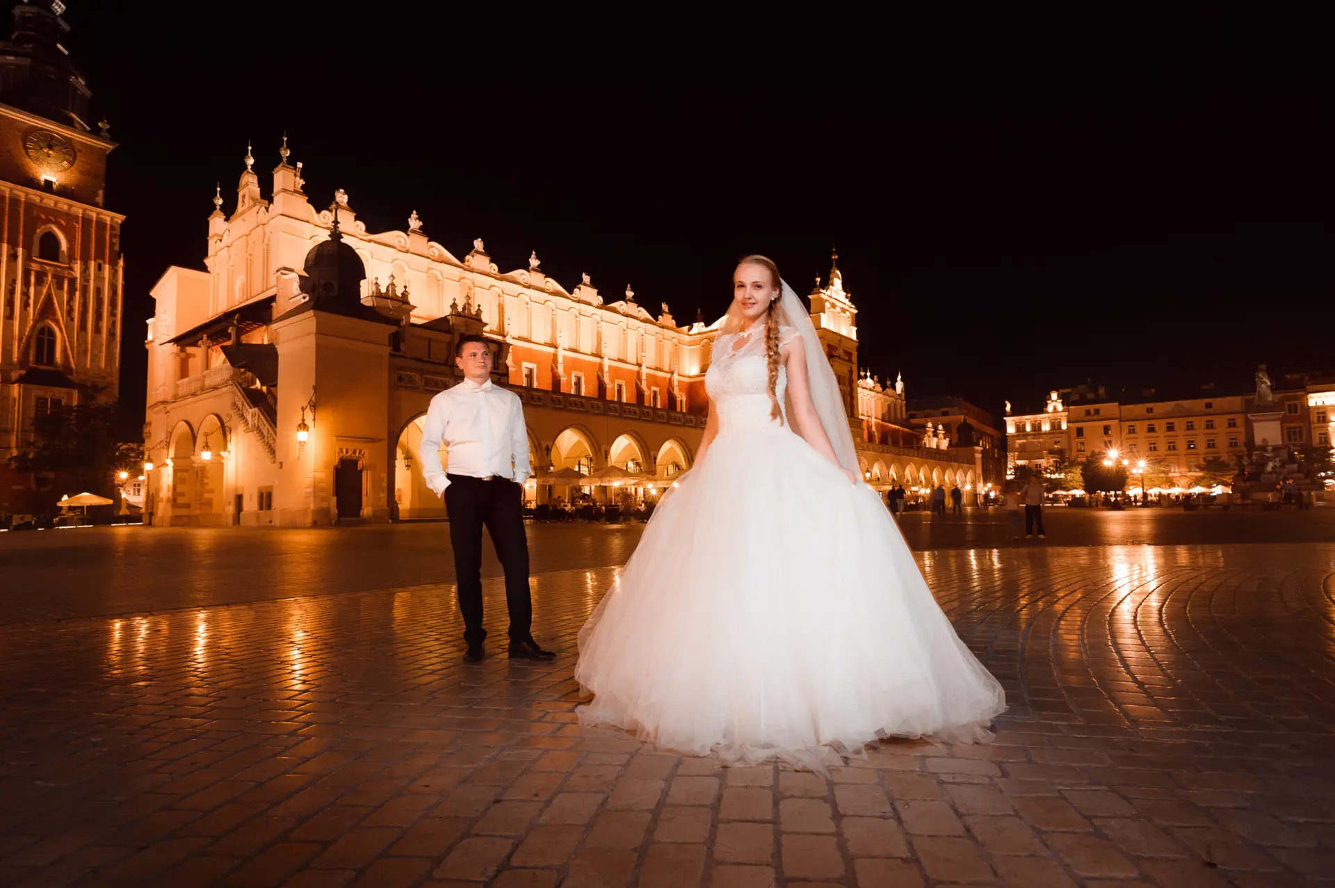 His gorgeous woman. Portrait of a beautiful bride on her wedding day on the night walk around the city with her husband